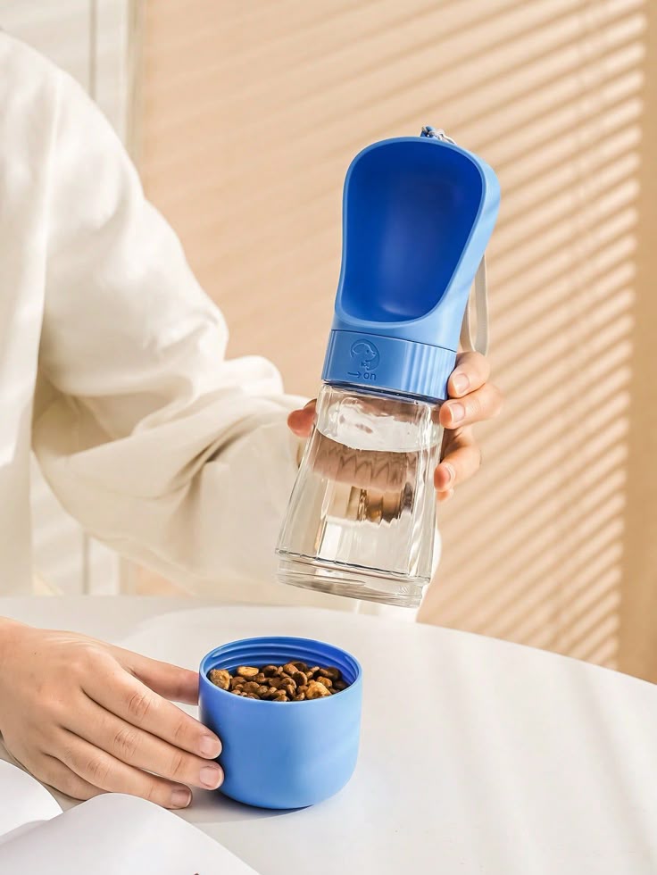 Portable pet travel bottle